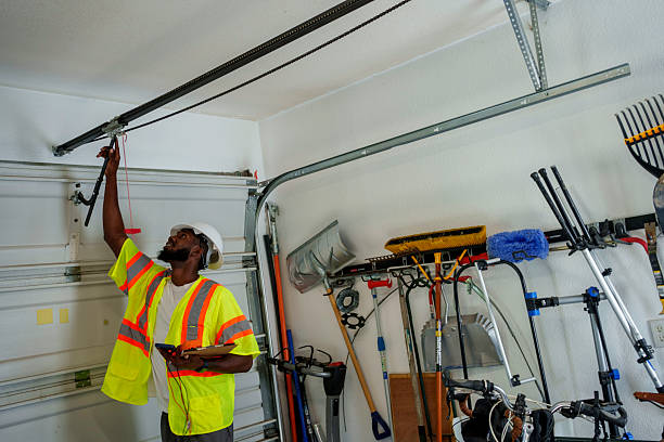 Professional Garage Door Panel Replacement technician working in Fort Lee, NJ